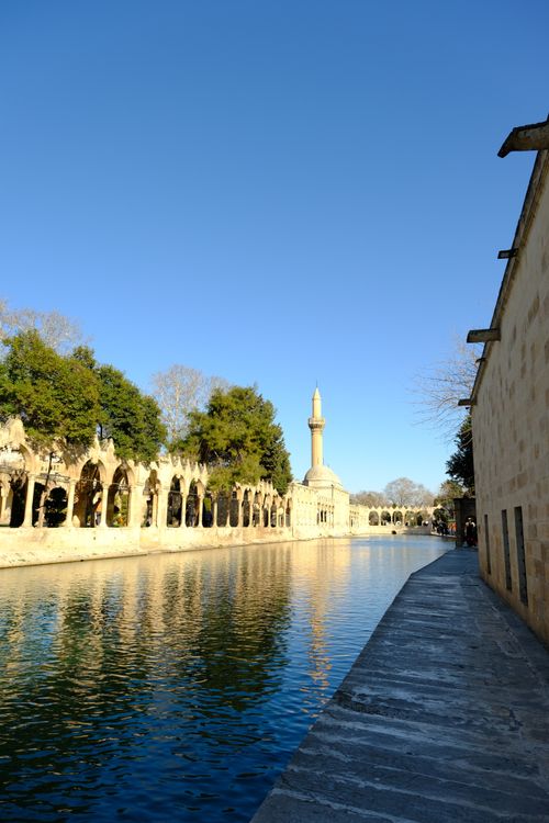 Free Beautiful view of Balıklıgöl Mosque and pond under clear blue sky. Stock Photo