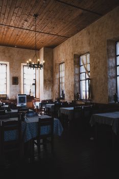 Warm and inviting interior of a traditional restaurant in Şirince, Türkiye, showcasing rustic charm.
