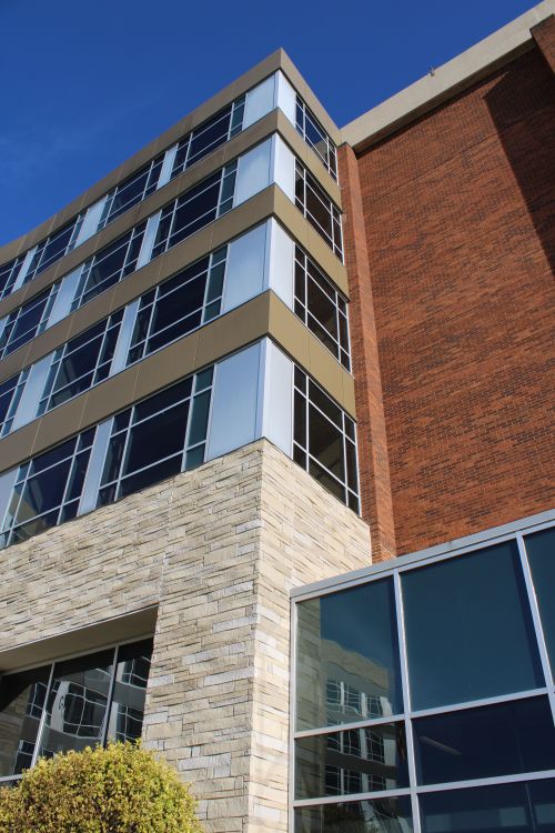 Free A modern commercial building with glass and brick facade in Lancaster, Ohio. Stock Photo