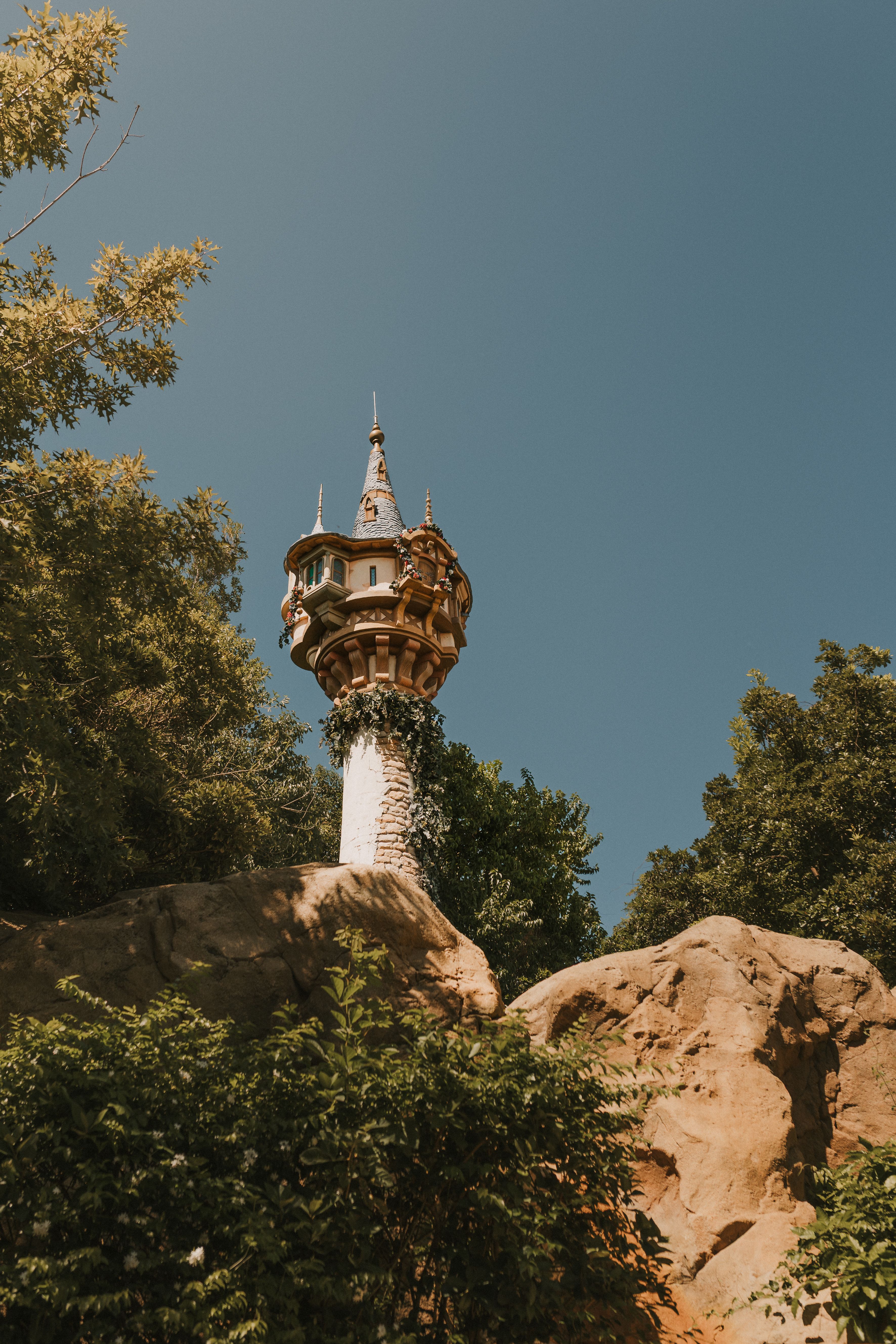 Captivating tower scene surrounded by nature, ideal for fantasy and fairytale themes.