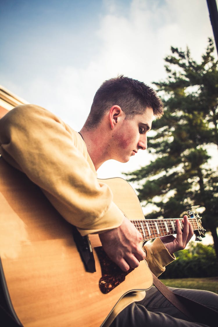 Man Playing Guitar