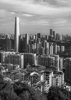 Striking black and white photograph of a city's skyline with towering skyscrapers.