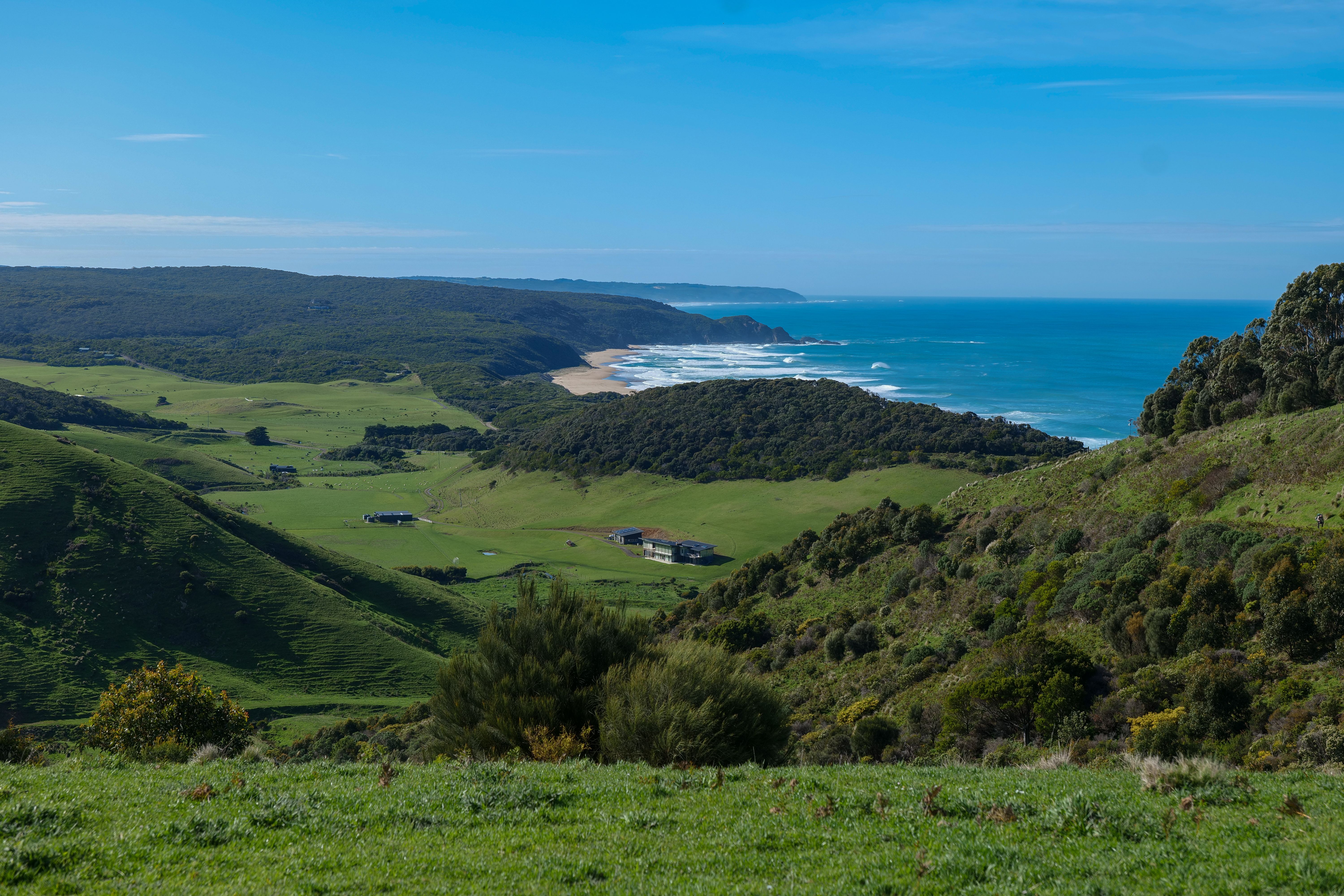 Beautiful panoramic view of coastline and rolling hills in Victoria, Australia.