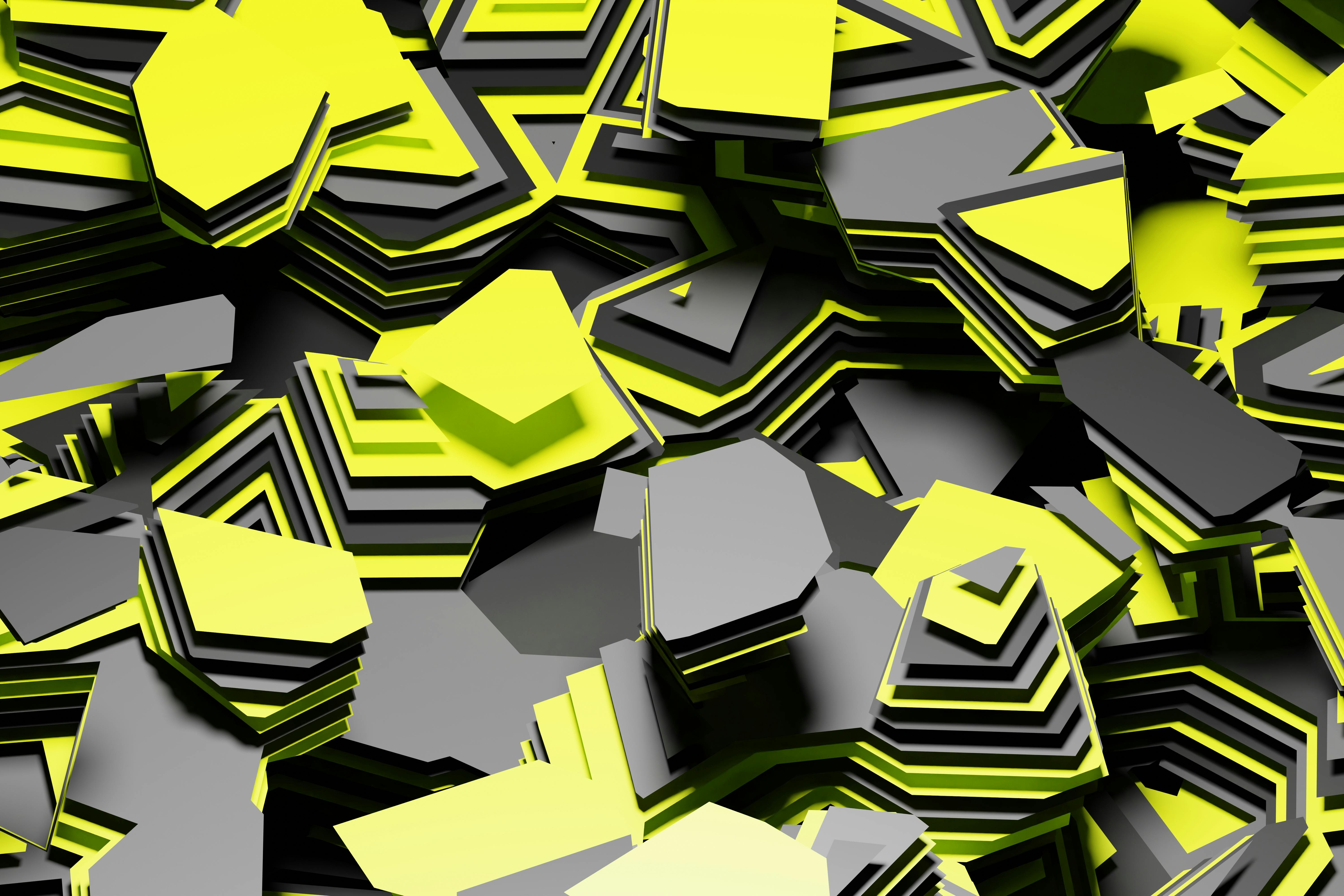 Gratis Immagine astratta dinamica di forme gialle e grigie sovrapposte che creano un vivido motivo geometrico. Foto a disposizione