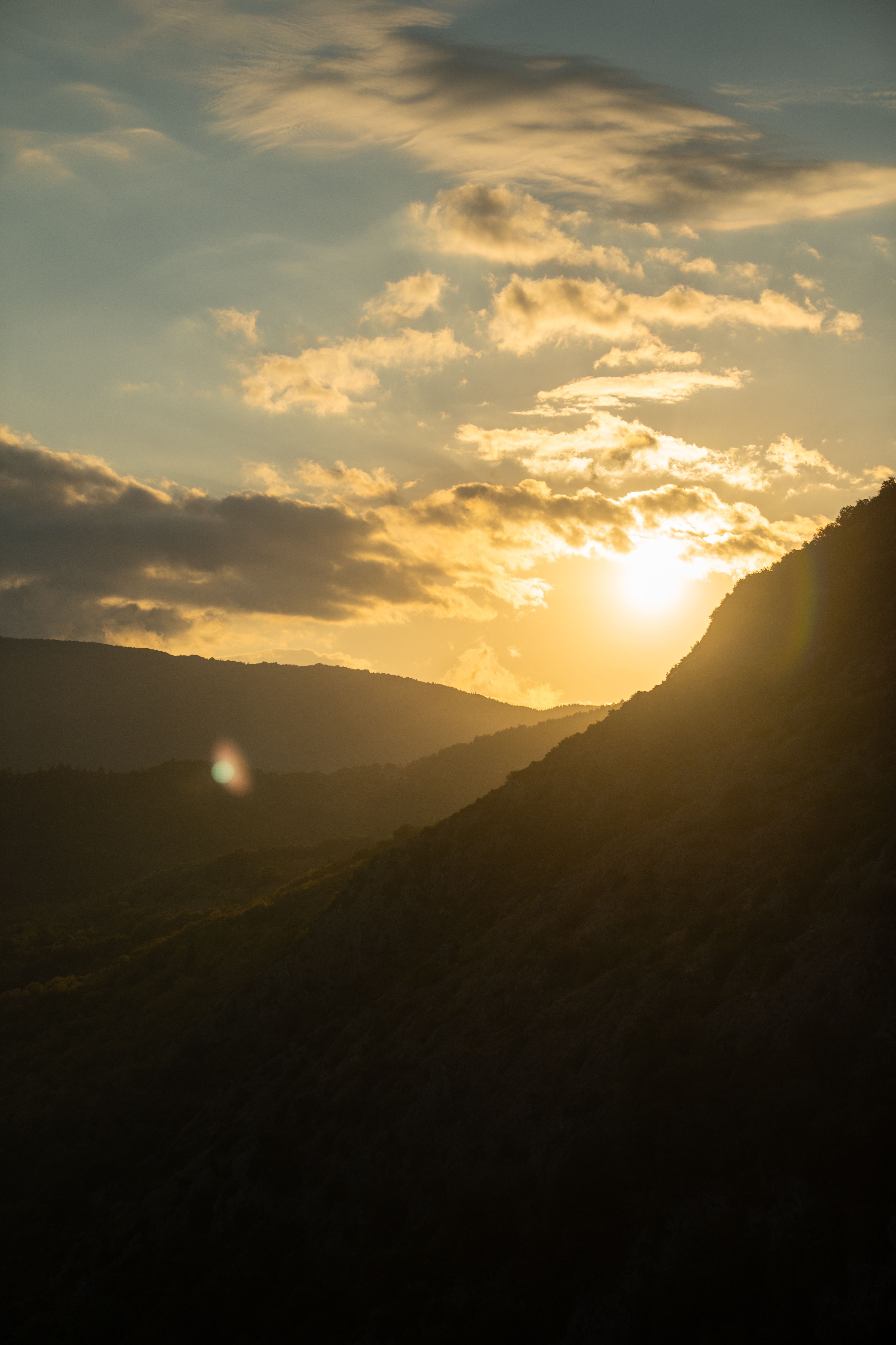Golden Sunset Over Mountain Range · Free Stock Photo