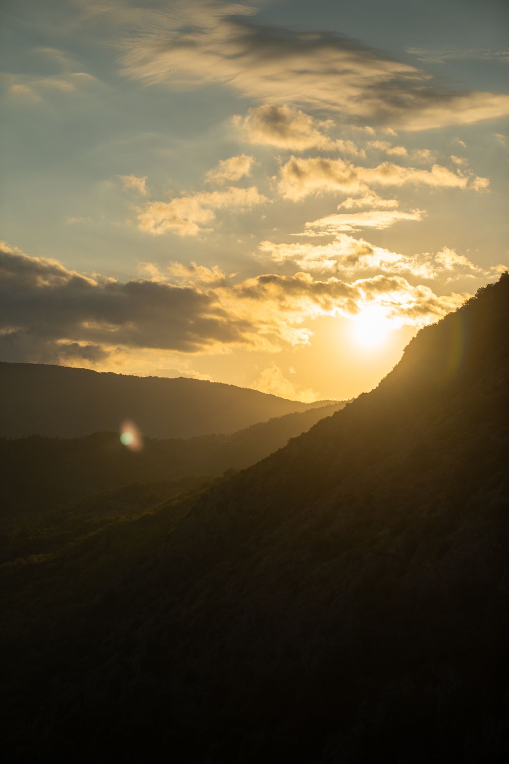Golden Sunset Over Mountain Range · Free Stock Photo