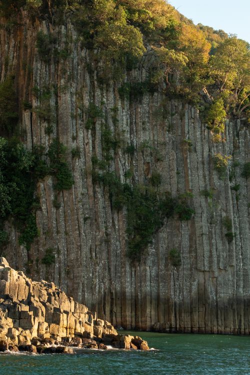 Scenic Coastal Cliff with Basalt Columns · Free Stock Photo