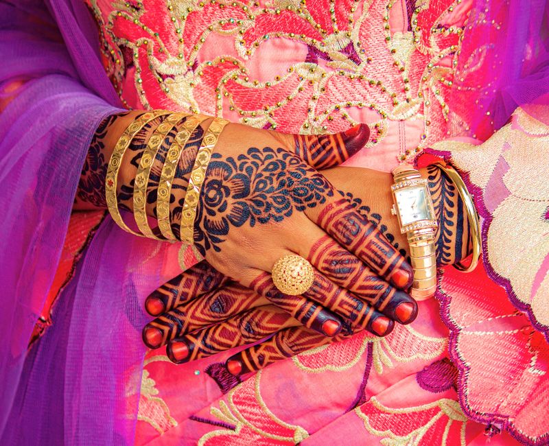 Colorful Moroccan wedding attire with intricate designs and patterns