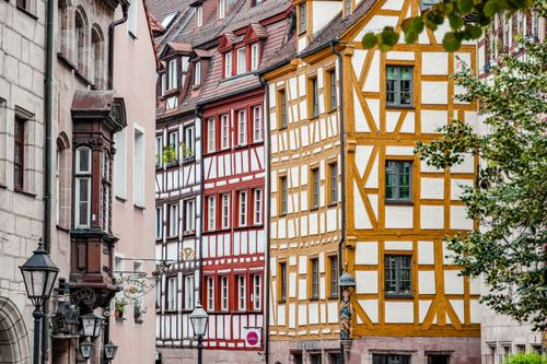 Free Scenic street view of colorful half-timbered houses in Nuremberg, Germany. Stock Photo