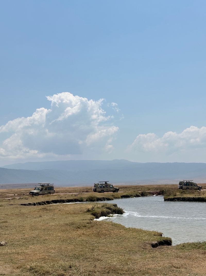 4 Days Tanzania Family Safari - safari jeeps at Ngorongoro Crater