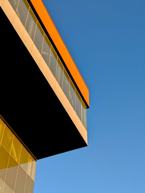 Free Contemporary building with clean geometric lines during golden hour in Sydney, Nova Scotia. Stock Photo