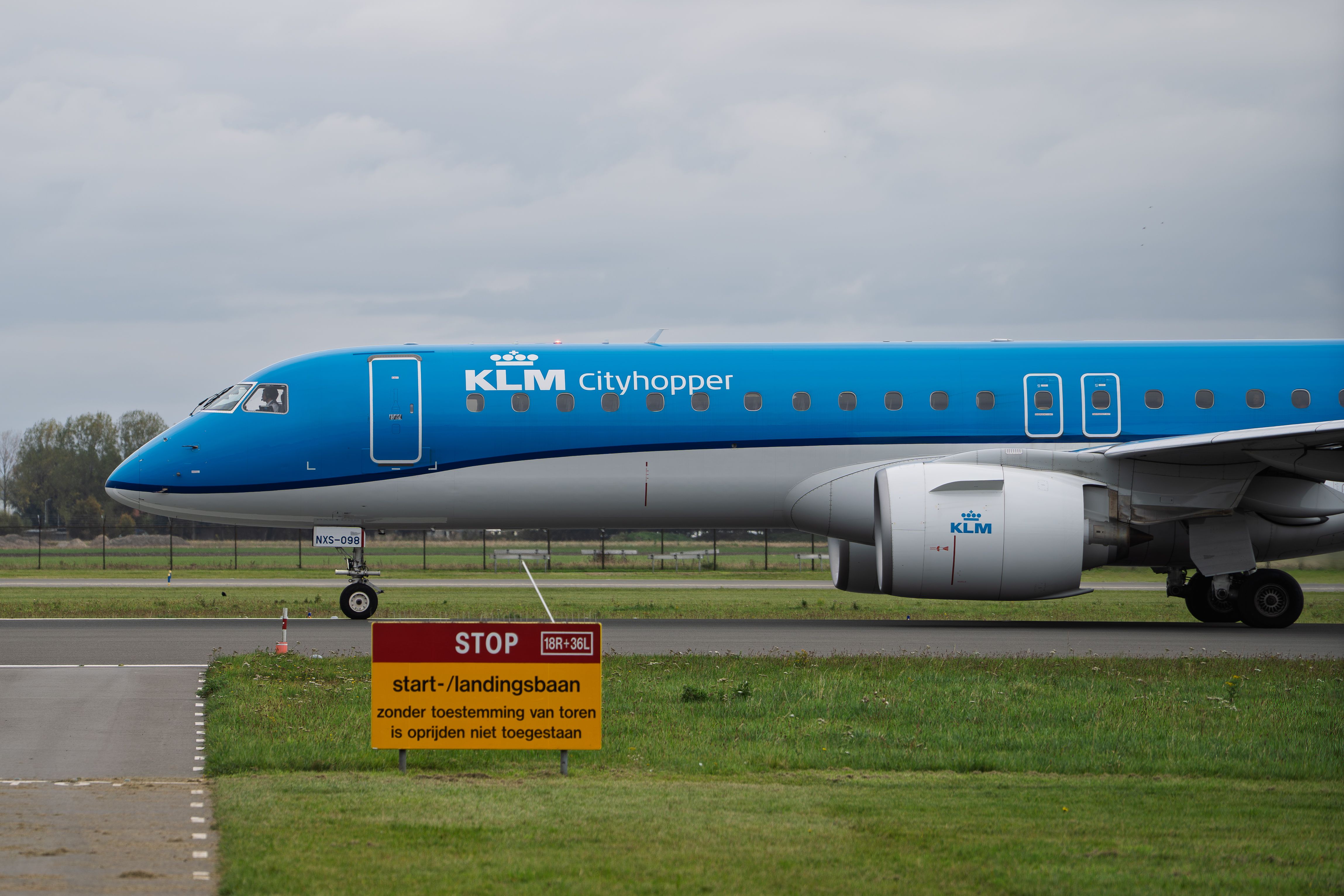 KLM Cityhopper Plane on Runway at Airport · Free Stock Photo