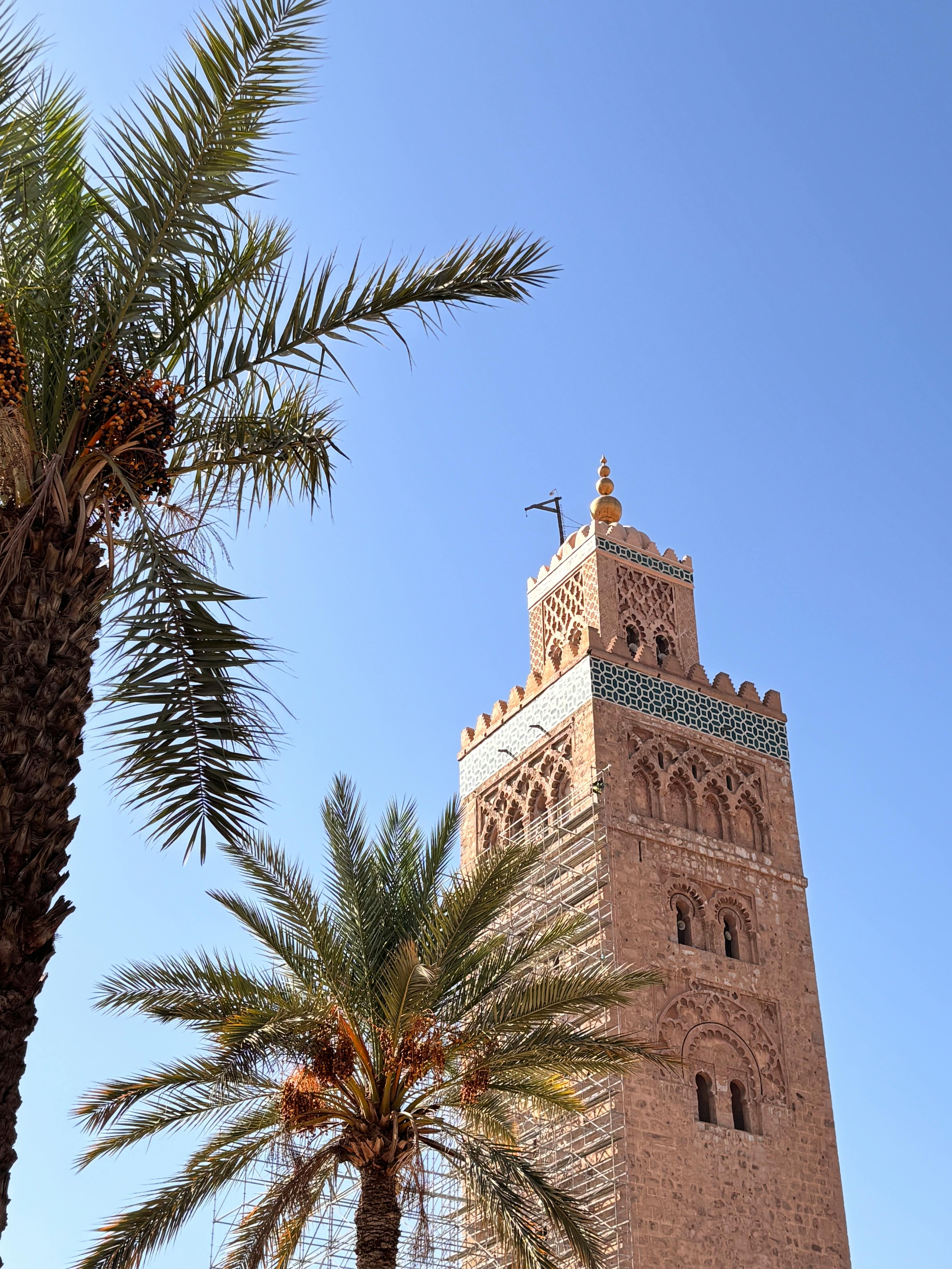 Iconic Koutoubia Mosque Minaret under Blue Sky · Free Stock Photo, image size:4284x5712