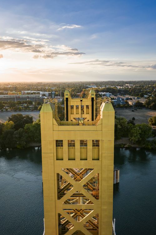 Free Aerial view of the iconic Tower Bridge in Sacramento during sunset with scenic skyline. Stock Photo