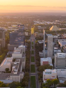 Captivating aerial view of Sacramento, California at sunset featuring the iconic Tower Bridge and city skyline.