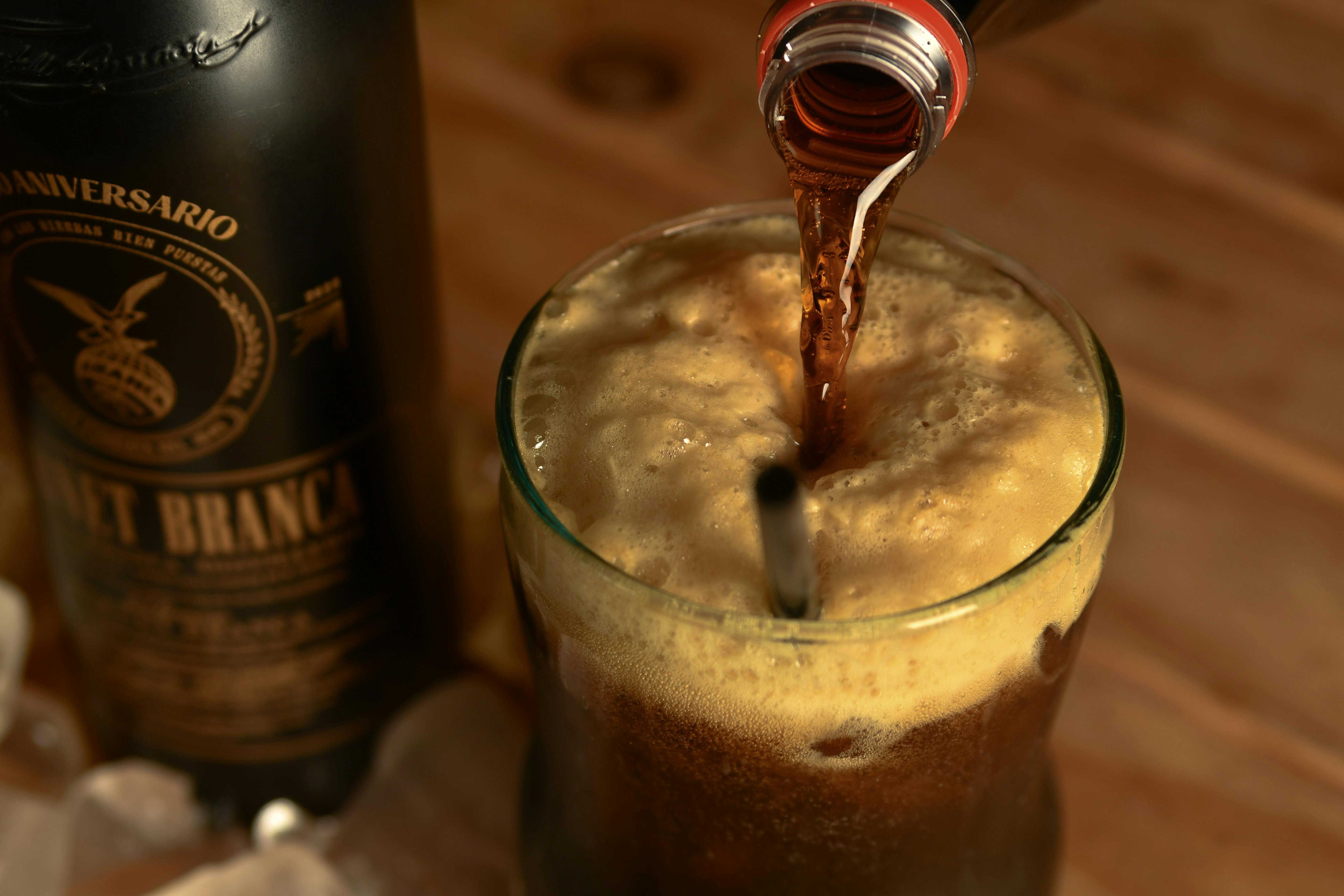 Soda In A Glass With Ice And A Straw