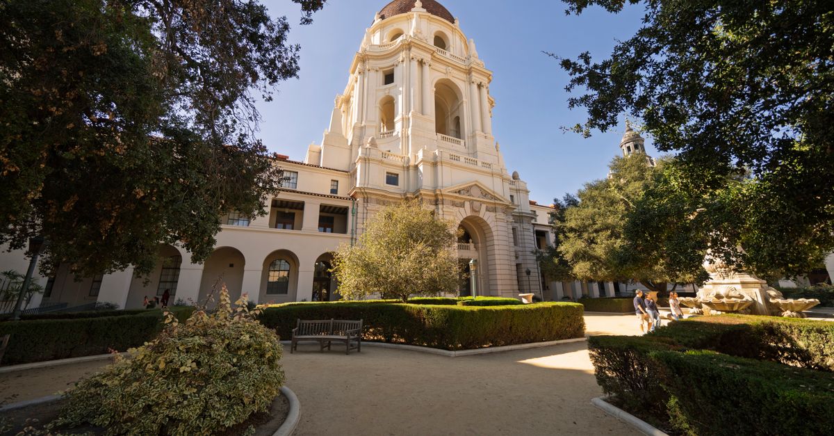 Elegant view of Pasadena City Hall with lush gardens on a sunny day.