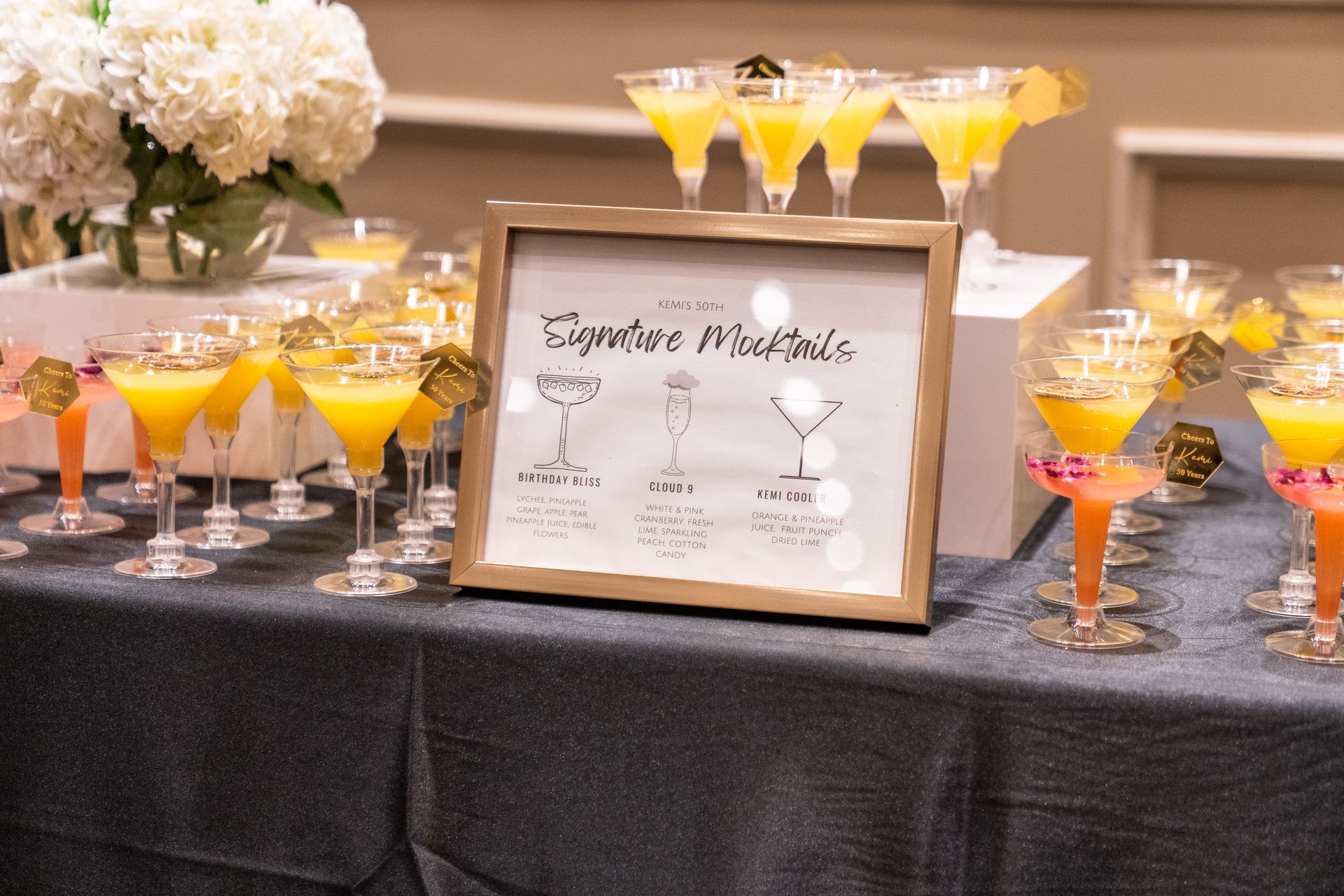 Colorful signature drinks displayed at an elegant event