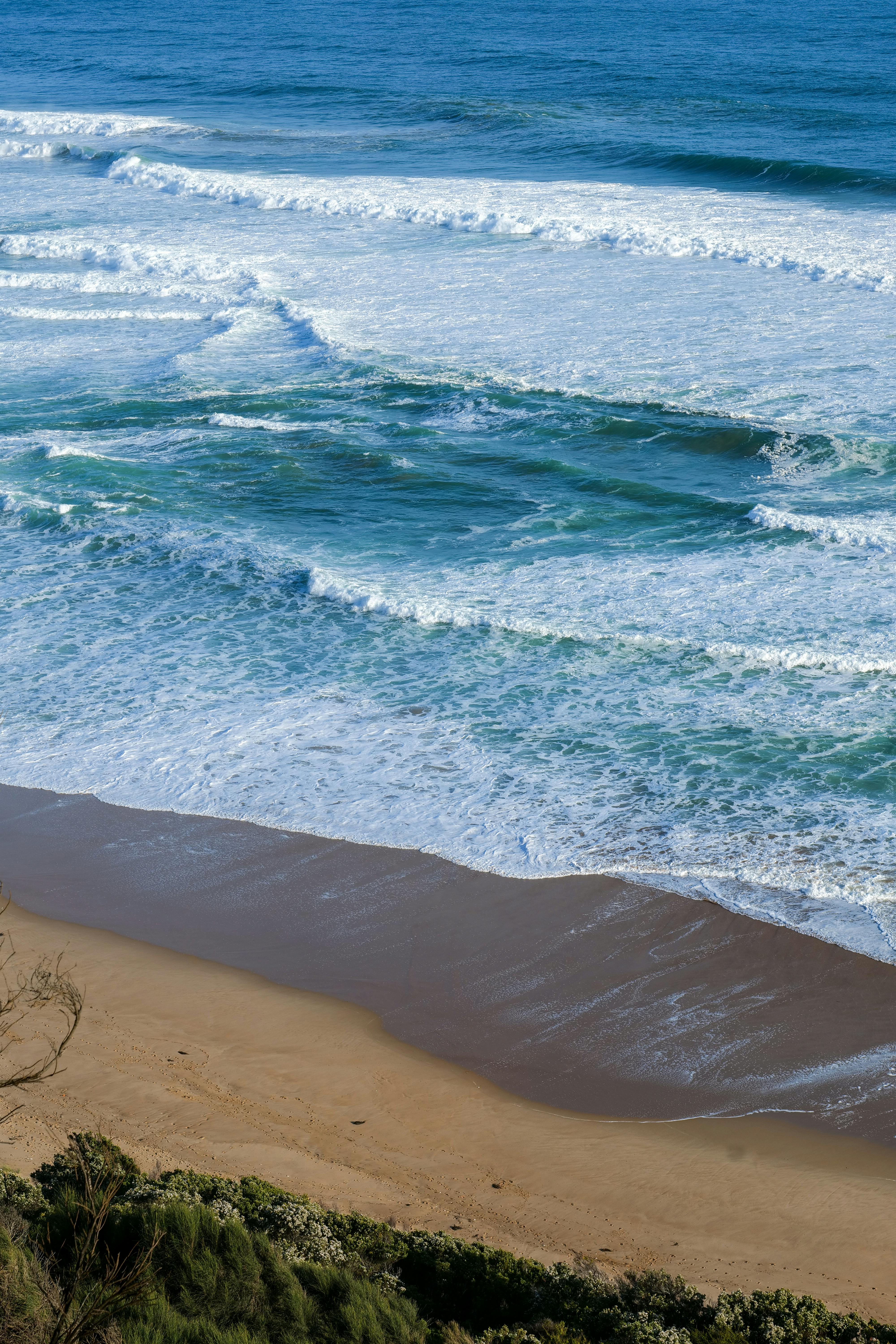 Explore the breathtaking wave formations along Johanna Beach in Victoria, Australia.
