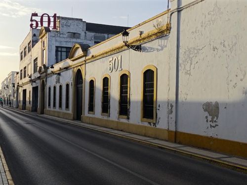 Free Historic streetscape of El Puerto de Santa María, showcasing classic Andalusian architecture. Stock Photo