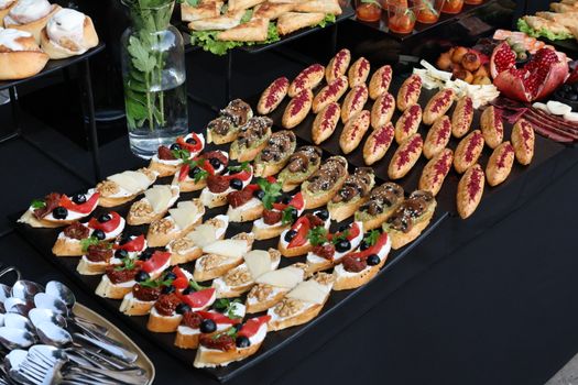 A vibrant assortment of finger foods on a table, perfect for catering and event dining.