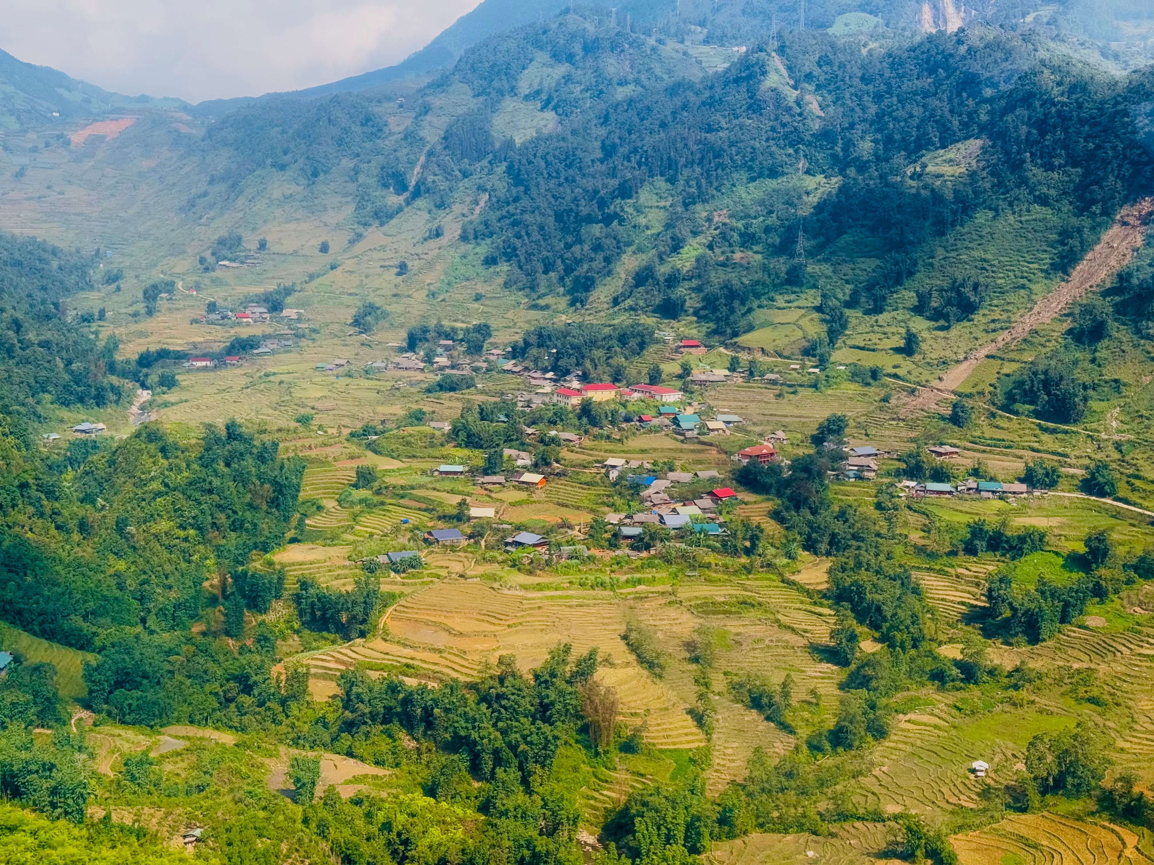 Aerial View of Rural Village in Lush Green Valley · Free Stock Photo