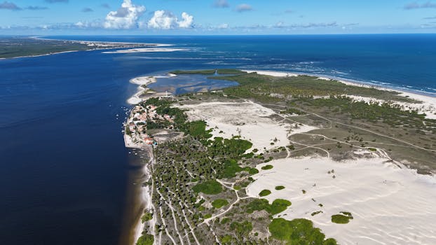 Stunning aerial view of the picturesque Brazilian coastline with clear blue waters and lush greenery.