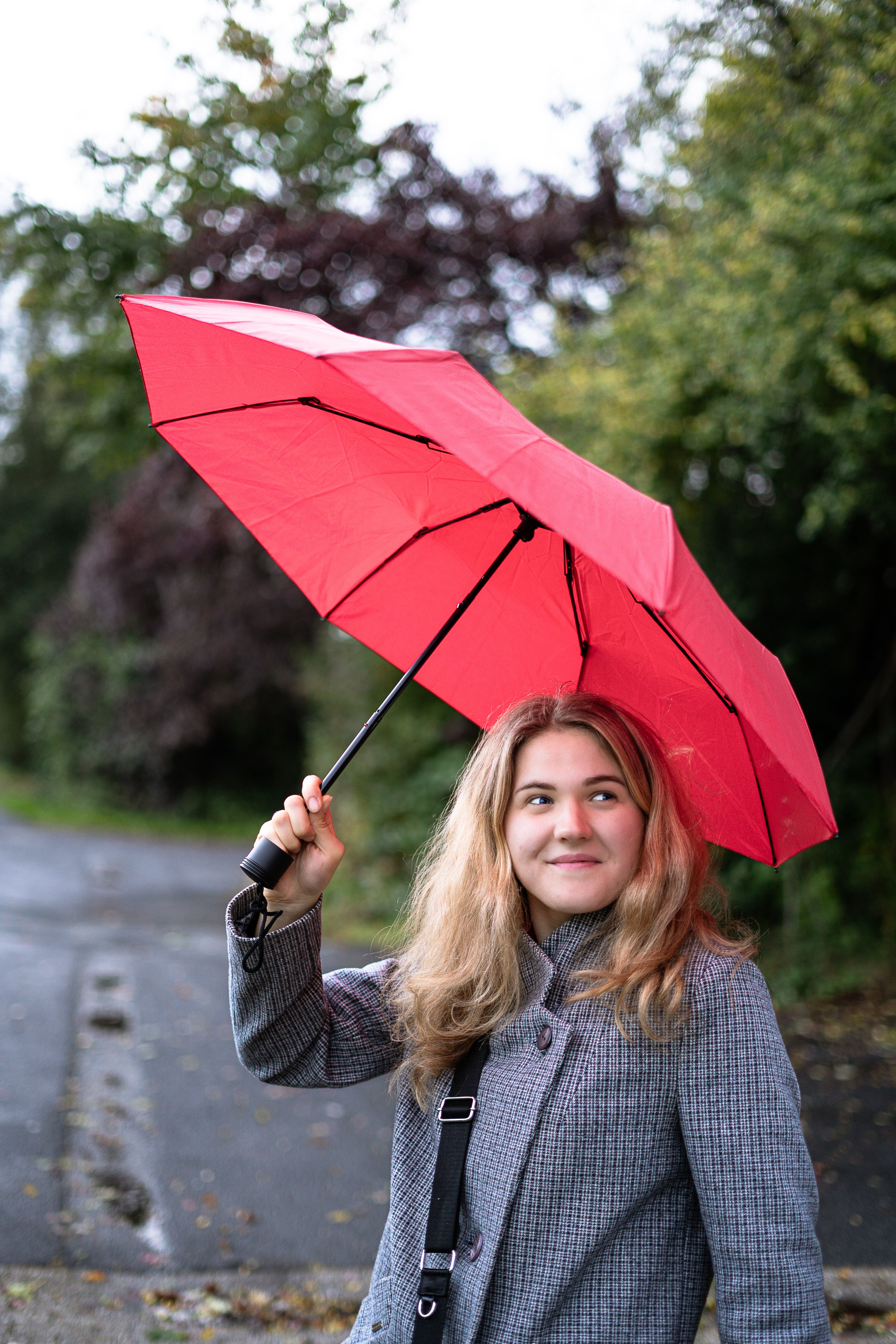 Young Woman with Red Umbrella Outdoors in Fall · Free Stock Photo