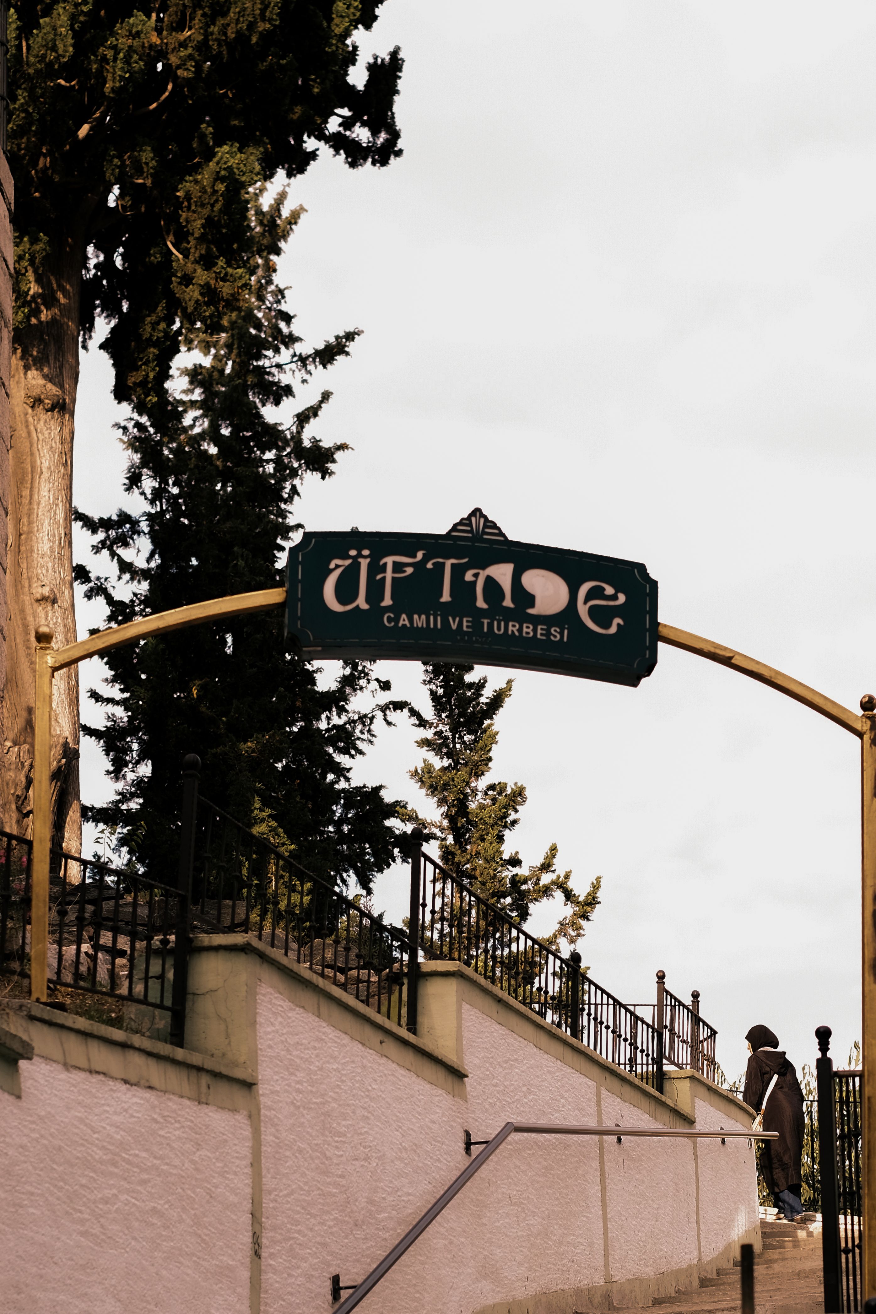 Üftade Camii Entrance with Trees and Sign · Free Stock Photo