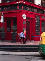 A red building on a Bengaluru street