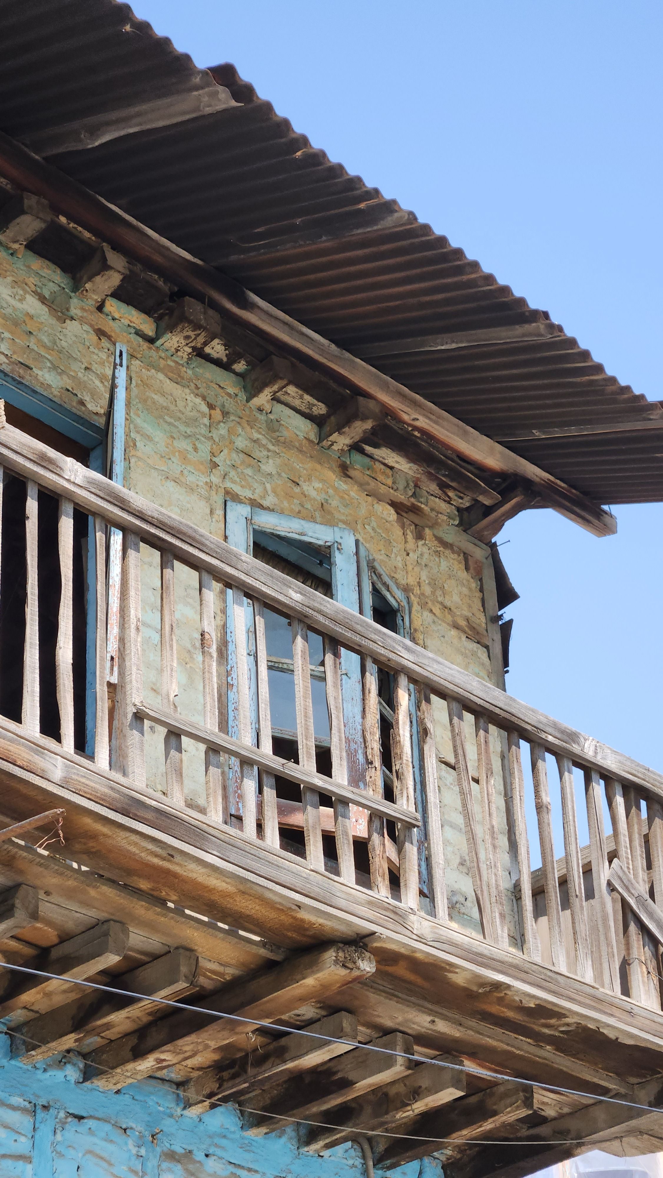 Rustic Old Building with Wooden Details · Free Stock Photo