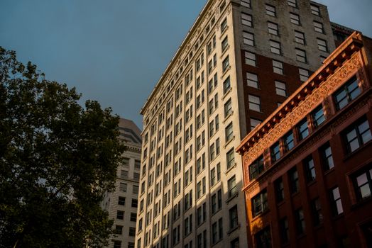 A view of classic architecture in downtown Seattle, Washington during sunset.