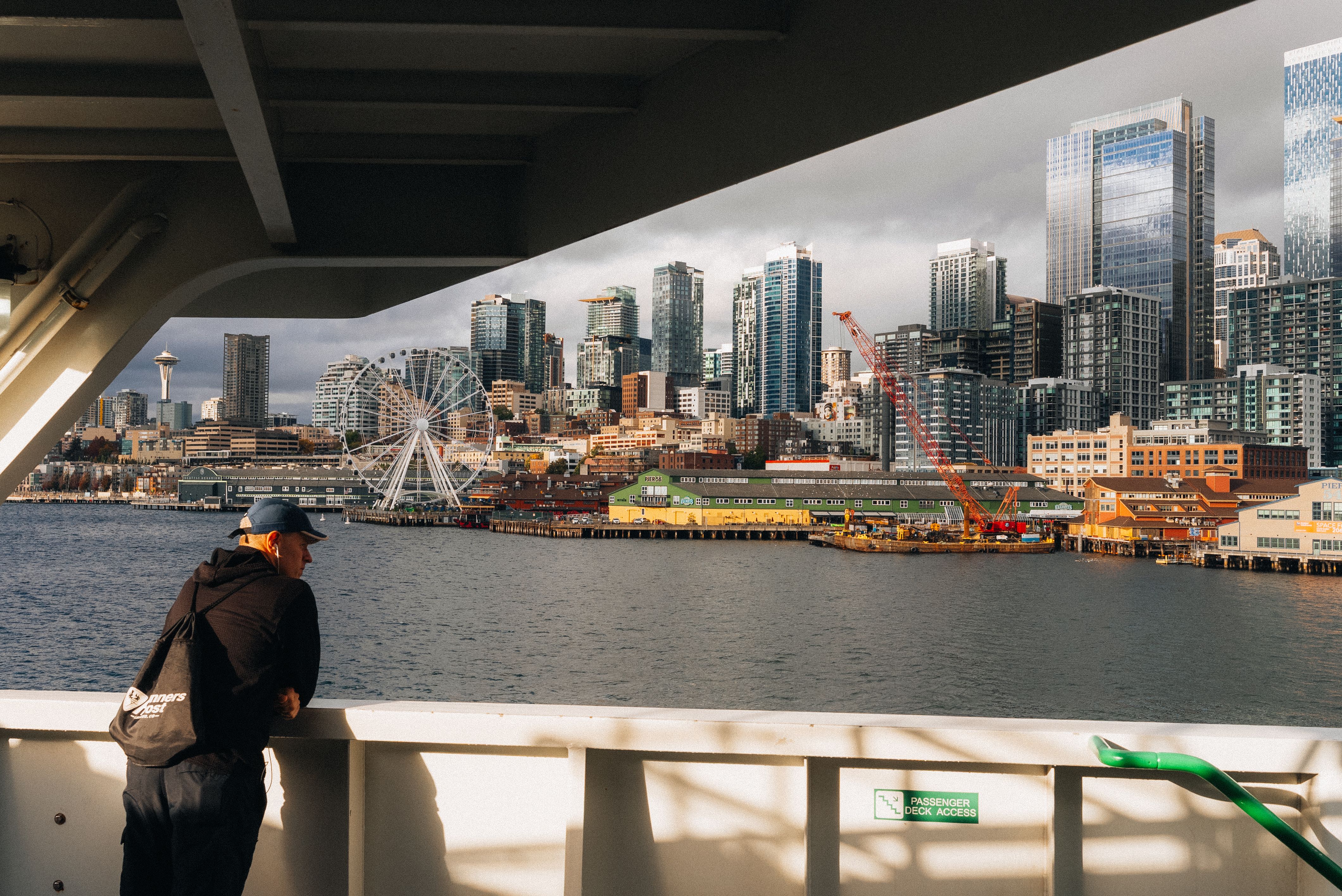 Seattle skyline from the ferry with iconic landmarks · Free Stock Photo