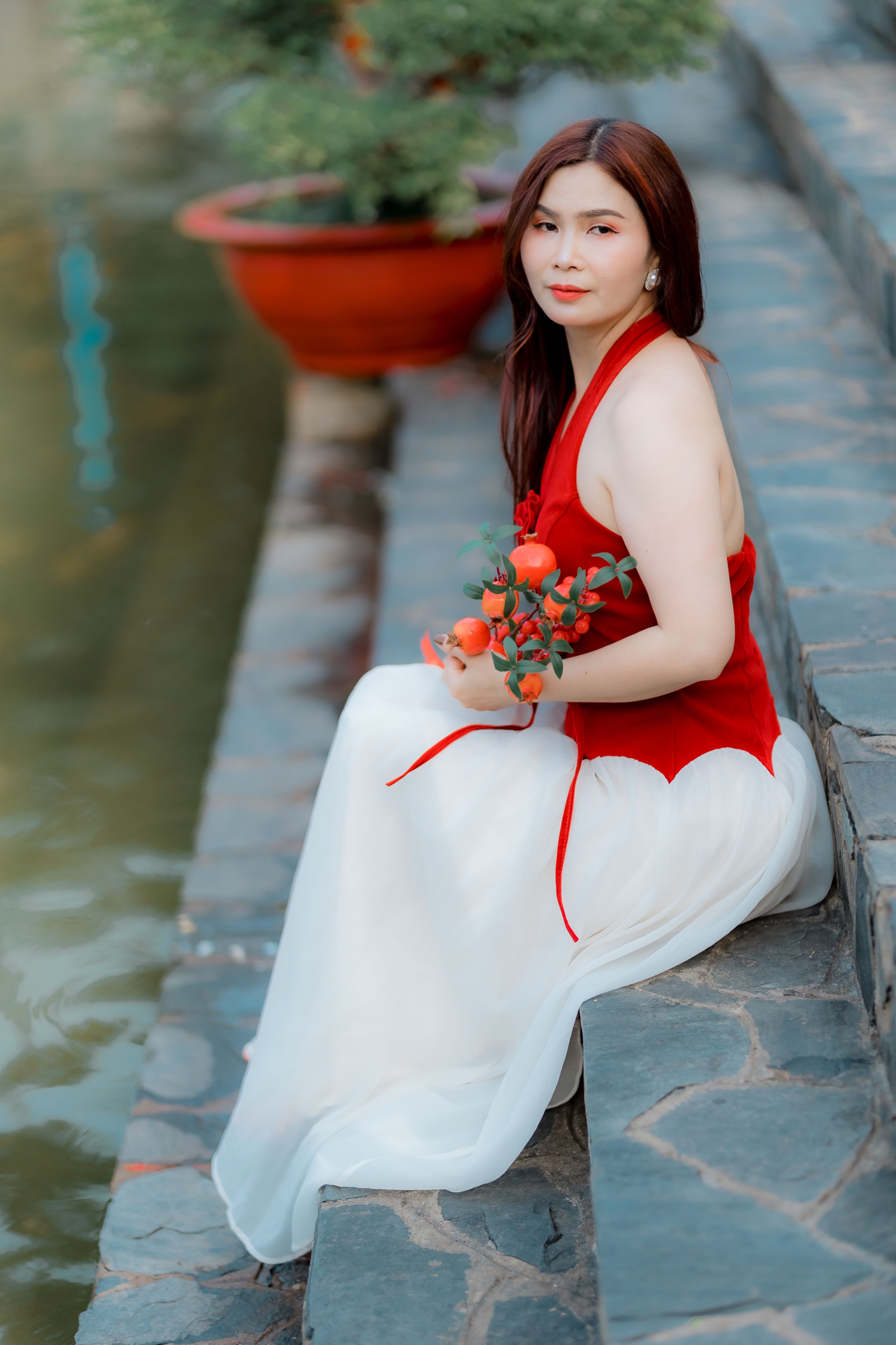 Elegant Woman in Red Dress by Pond · Free Stock Photo
