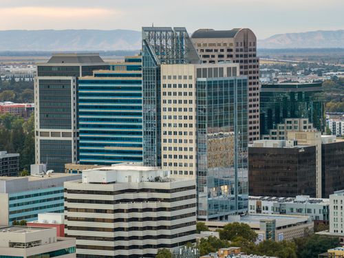Free Aerial view showcasing the modern skyline of downtown Sacramento, California with its iconic high-rise buildings. Stock Photo