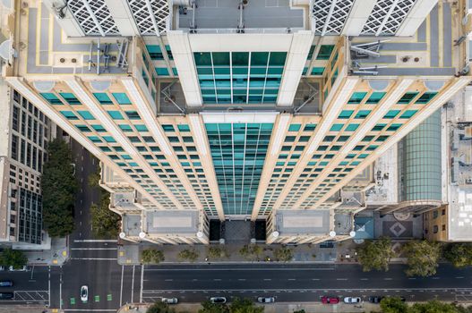 Top-down aerial view of a skyscraper in Sacramento, showcasing modern architecture and city layout.