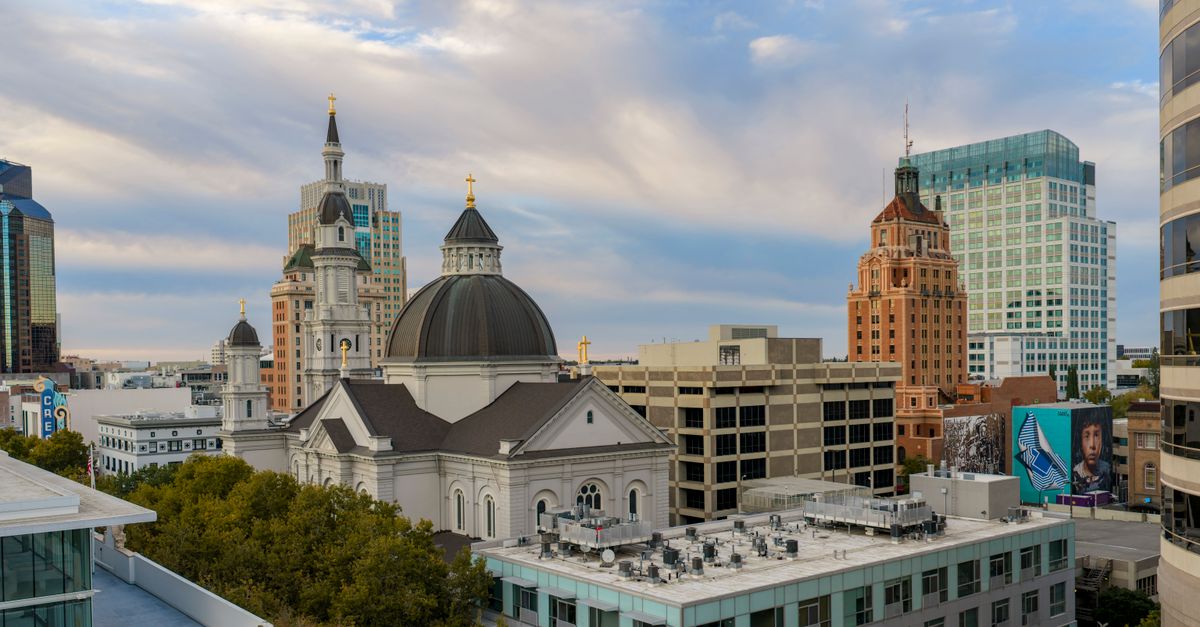 Aerial view of Sacramento's architectural landmarks under a vibrant sky.