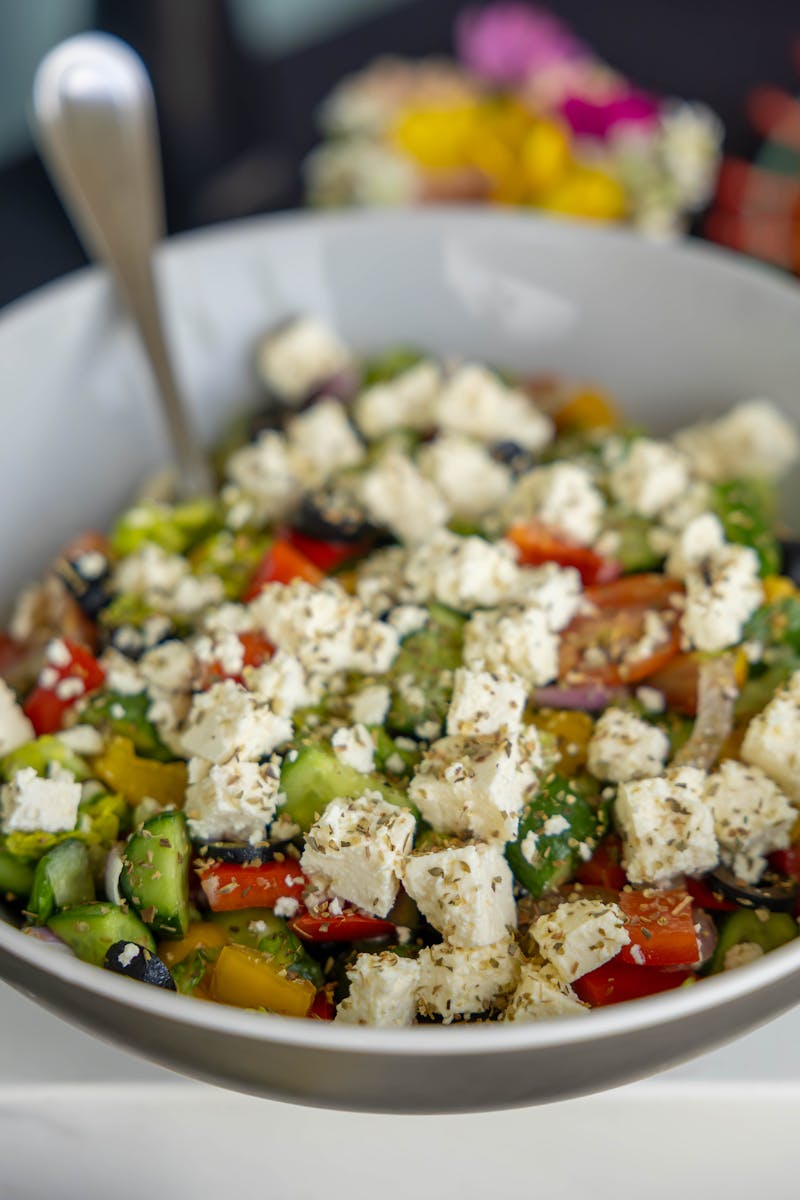 The finished Greek salad with feta on top