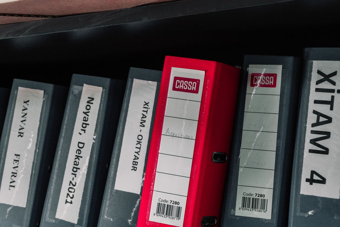 Colorful Office Binders in Storage Shelf · Free Stock Photo