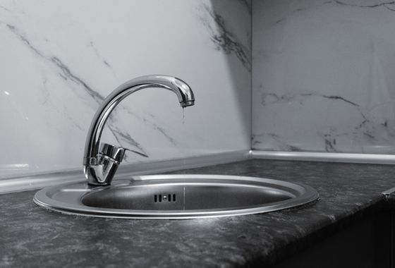 Kitchen faucet dripping water
