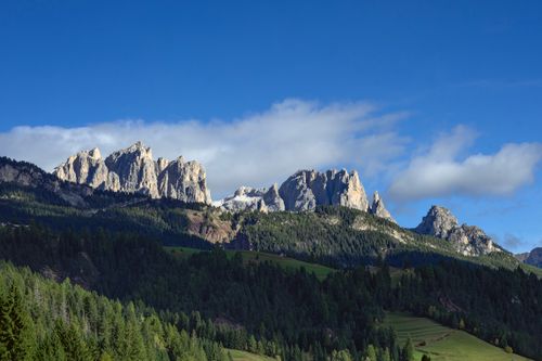 Free Breathtaking view of the Dolomites mountains during a clear day in Val di Fassa, Italy. Stock Photo
