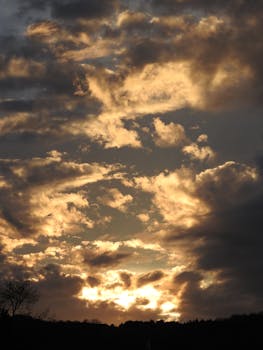 Stunning sunset with golden clouds and dramatic sky, perfect for nature enthusiasts.