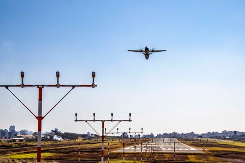 Free A small airplane takes off from Londrina Airport, Paraná, captured with runway in foreground. Stock Photo