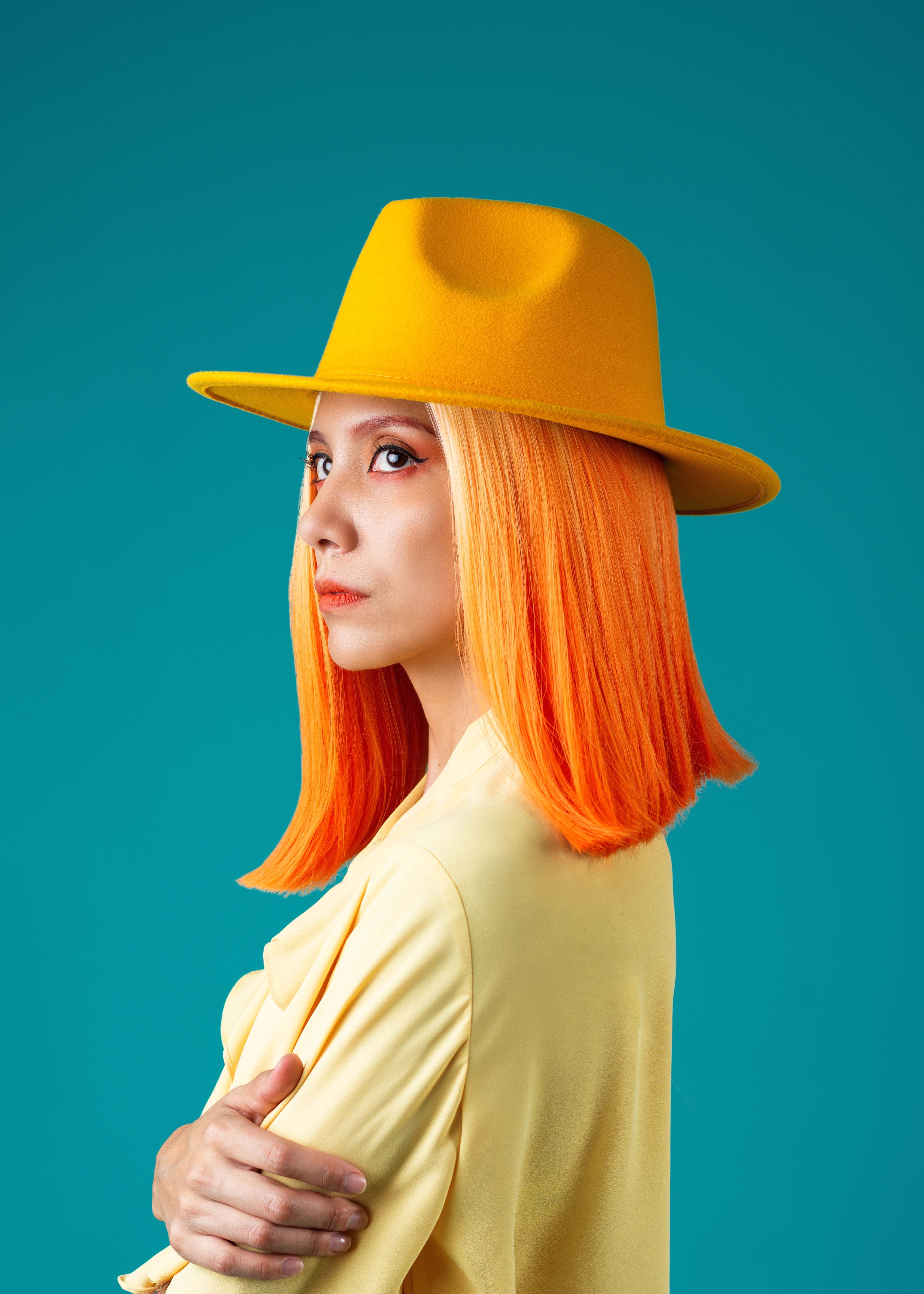 Colorful Portrait of a Woman in Yellow Hat · Free Stock Photo