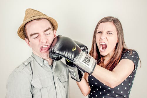Woman Punching Men's Face