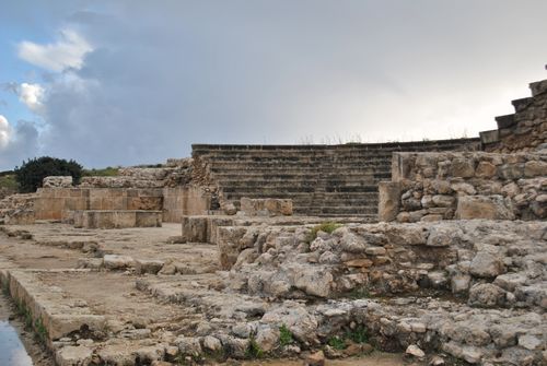 Free Explore the ancient Roman amphitheater ruins with dramatic skies, showcasing historical architecture in an open-air setting. Stock Photo