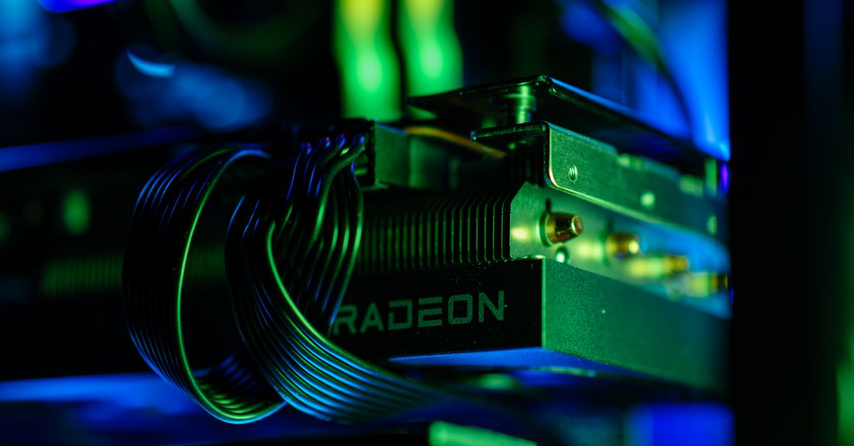 AMD to supply tens of billions in AI servers to Anthropic and invest up to $5 billion in the startup Detailed close-up of a gaming PC's Radeon graphics card with vibrant RGB lighting, showcasing cables and hardware.