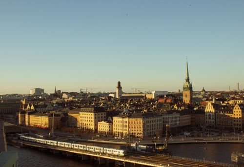 Free Aerial view of Stockholm's historic cityscape and waterfront during evening light. Stock Photo