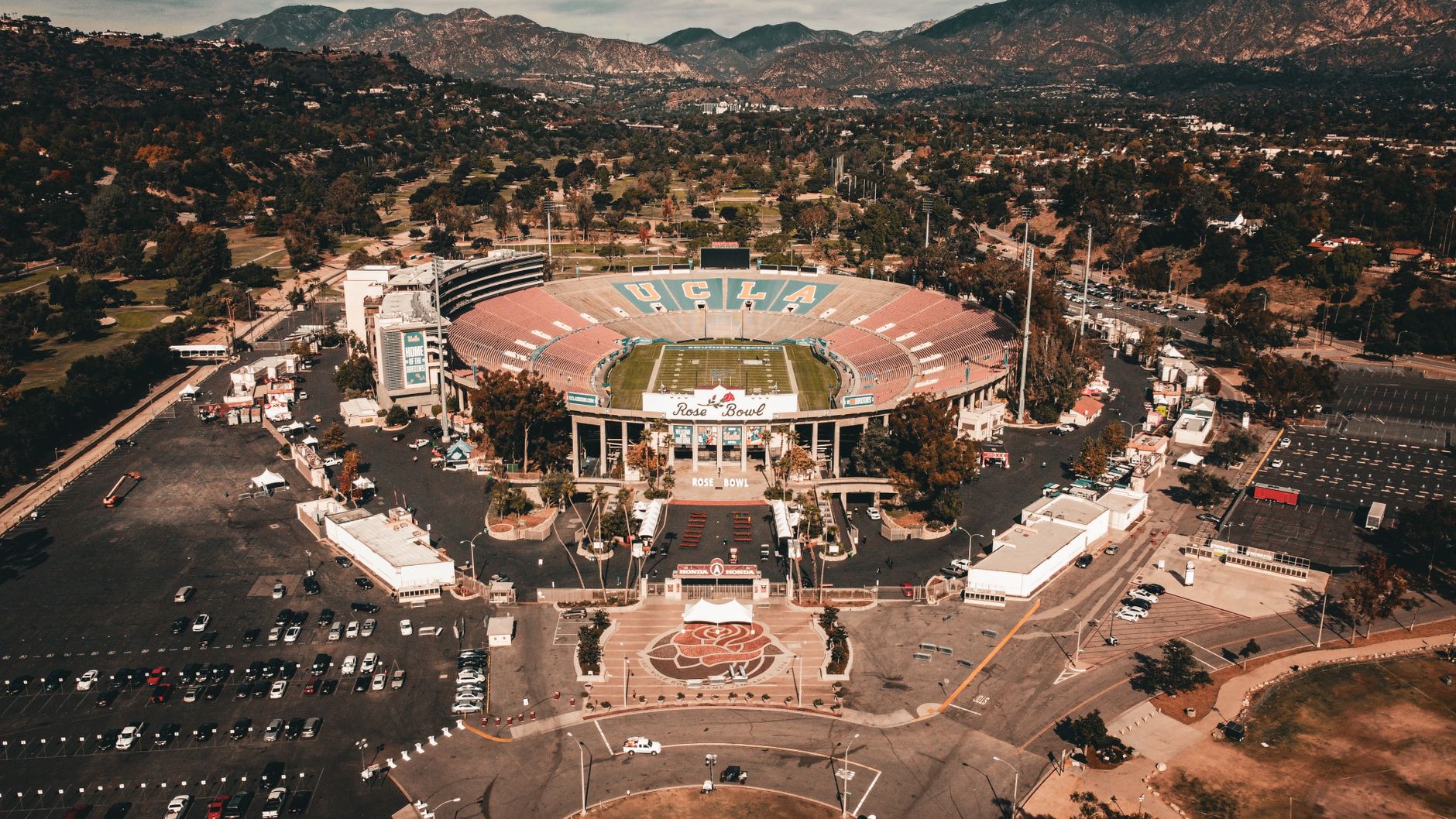 Los Angeles Memorial Coliseum fan festival stage prepared for FIFA World Cup supporters during summer daylight