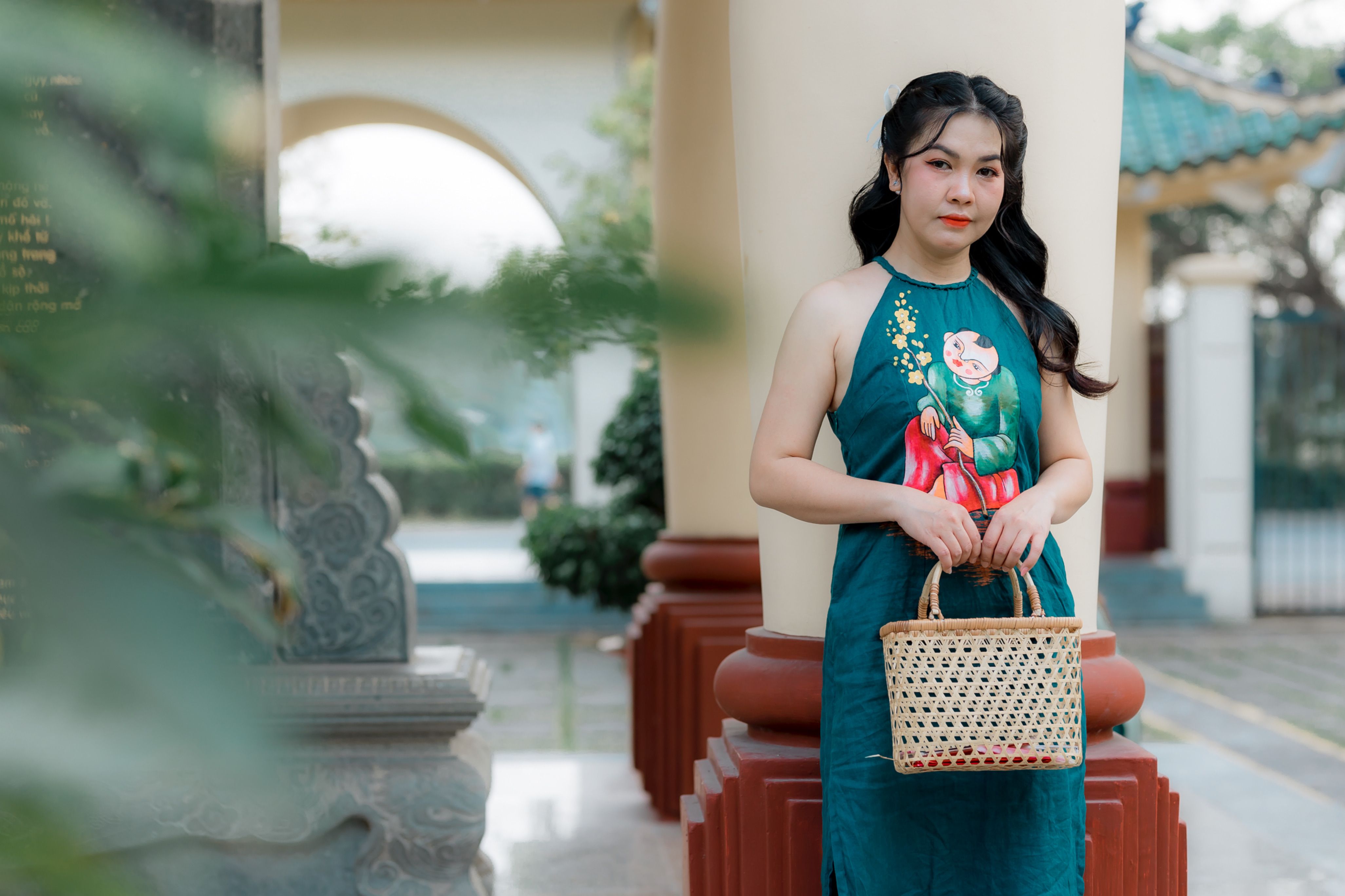Young Woman in Traditional Dress Holding Wicker Basket · Free Stock Photo